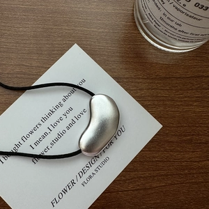 Minimalist S925 sterling silver matte bean pendant necklace with simple black cord cord