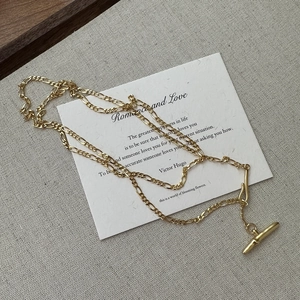 Elegant gold S925 sterling silver Figaro long necklace with a minimalist toggle clasp