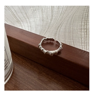 Detailed close-up of S925 sterling silver ring with unique wrinkled twisted texture