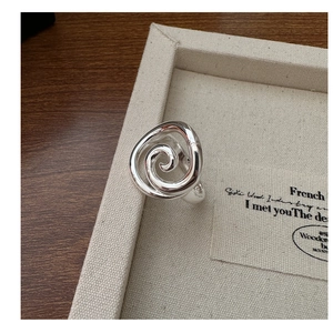 Detailed view of S925 sterling silver spiral ring showing the official hallmark stamp