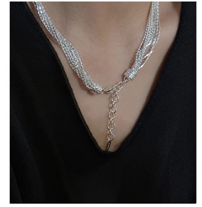 Detail view of multi-layer S925 sterling silver chain bracelet with textured twisted strands