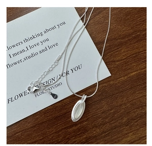 Detail of S925 sterling silver drop necklace with agate pendant and lobster clasp