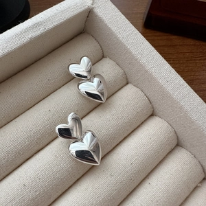 Elegant S925 sterling silver double heart stud earrings with a high polished mirror finish