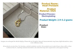 Macro view of gold S925 sterling silver heart pendant with textured structural lines