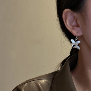 S925 silver butterfly earrings with white shell on model for minimalist style