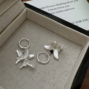 Elegant S925 sterling silver butterfly drop earrings with shell texture and silver hoops