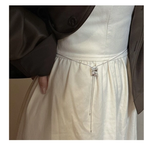 Close-up of minimalist S925 silver square slide pendant on long adjustable sweater chain