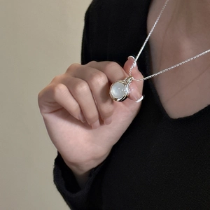 Minimalist S925 sterling silver necklace with white agate pendant on model