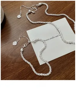 Close-up of S925 sterling silver beaded texture chains with adjustable sliding clasp and tag