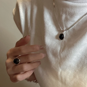S925 sterling silver jewelry set featuring black agate pendant necklace and ring on model
