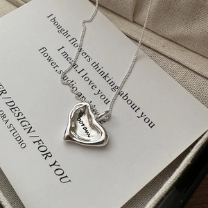 S925 sterling silver heart pendant necklace with polished finish and engraved detail