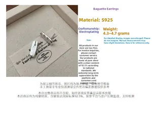Macro detail of S925 sterling silver baguette stud earrings with 4.5g weight specs