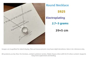 Macro detail of S925 sterling silver knotted circle pendant necklace with 39+5cm chain