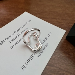 Minimalist S925 sterling silver open ring with twisted abstract knot design on card