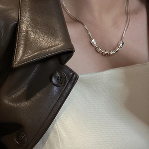 S925 sterling silver necklace with textured irregular beads on a delicate chain for women