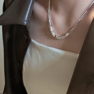Minimalist S925 sterling silver necklace with irregular liquid texture silver beads on model
