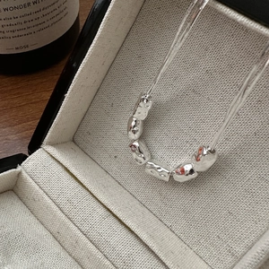 Minimalist S925 sterling silver necklace with unique hammered pebble beads design