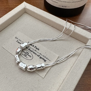 Minimalist S925 sterling silver necklace with textured lava beads and triple snake chains