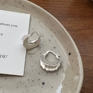 Minimalist S925 sterling silver hoop earrings with matte finish and wavy double-layer design