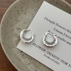 Minimalist S925 sterling silver hoop earrings with matte finish and wavy texture design