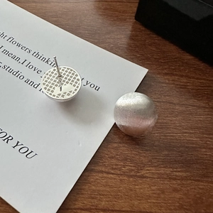 Matte S925 sterling silver brushed round stud earrings showing front and back details