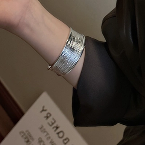 S925 sterling silver open bangle featuring heavy industrial texture and matte finish