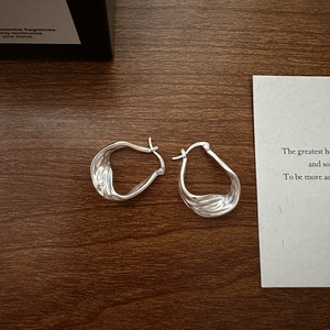 S925 sterling silver hoop earrings with irregular lava texture and liquid metal design