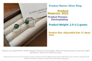 Detail of S925 sterling silver nugget ring with 9mm green bead in a wooden gift box