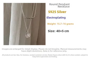 Detail of S925 sterling silver double-layer necklace with round pendant and bar