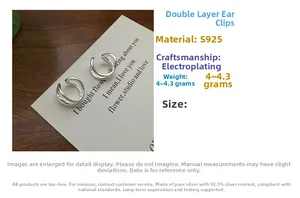 Macro shot of minimalist S925 sterling silver double-layered ear cuffs with electroplated finish