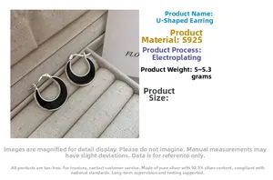 Detailed macro view of S925 silver U-shaped hoop earrings with black enamel inlay