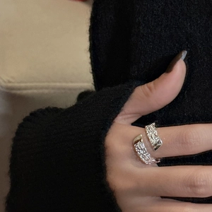 Minimalist S925 sterling silver open ring with unique hammered texture on a model