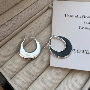 S925 sterling silver crescent hoop earrings with black enamel finish in jewelry box