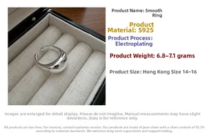 Detailed view of S925 sterling silver minimalist ring with polished finish in jewelry box