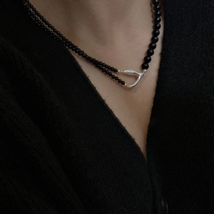 S925 silver minimalist necklace with black beads and asymmetric pendant on model
