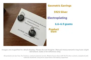 Detailed view of S925 sterling silver earrings with black marble texture rings