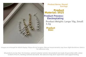 Macro detail of S925 sterling silver ball earrings showing large and small sizes