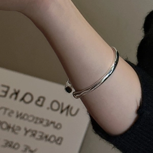 Minimalist 925 sterling silver open bangle with wavy design and high polish finish