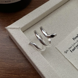 Minimalist S925 sterling silver snake-shaped wrap ring with black gemstone accents