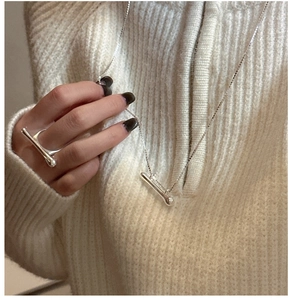 Minimalist S925 silver liquid stream necklace and geometric ring set on knit sweater