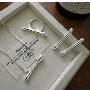 Minimalist silver jewelry set with cylinder bar pendant necklace, ring and earrings