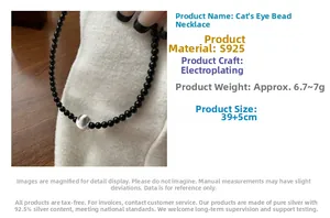 Detail of S925 sterling silver beaded necklace featuring a cat eye stone and 39cm chain