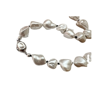 Baroque pearl necklace with silver oval clasp and irregular natural white pearls