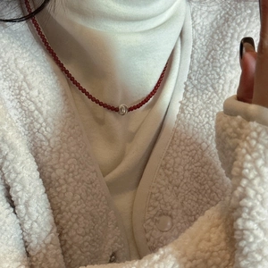 S925 sterling silver red beaded cat eye stone necklace with silver bead on white sweater