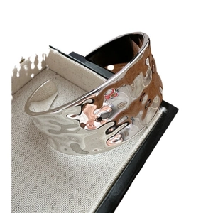 Polished S925 sterling silver wide open bangle with irregular hammered wave texture