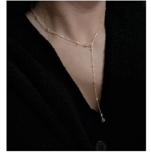 Detailed view of an elegant S925 sterling silver Y-shaped lariat necklace with beads
