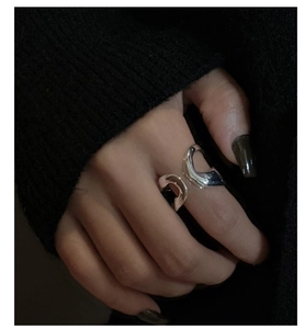 Detail of S925 sterling silver double layer ring with liquid metal wave texture