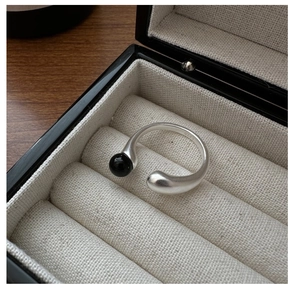 Macro detail of S925 sterling silver ring showing the S925 hallmark and matte finish