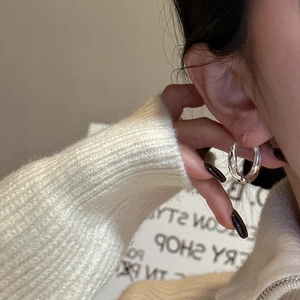Minimalist S925 sterling silver hoop earrings with irregular texture and high mirror polish