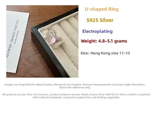 Macro shot of S925 sterling silver U-shaped ring highlighting the matte electroplated finish